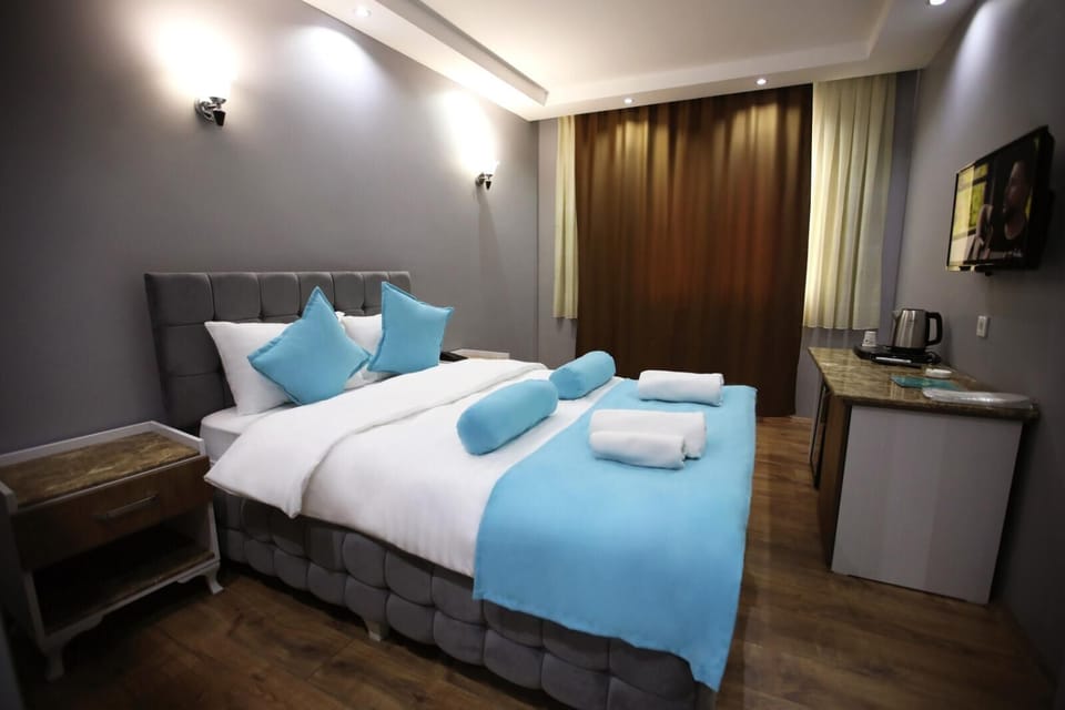 Premium bedding, minibar, desk, laptop workspace