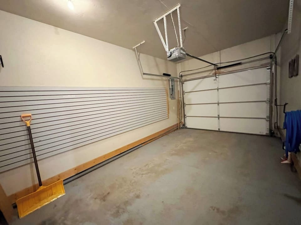 Keep your gear dry and store your vehicle in this one-car garage!