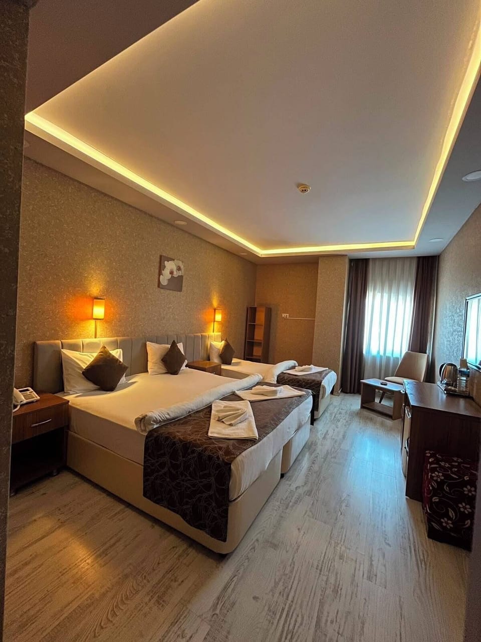 Deluxe Triple Room | Premium bedding, minibar, in-room safe, individually decorated