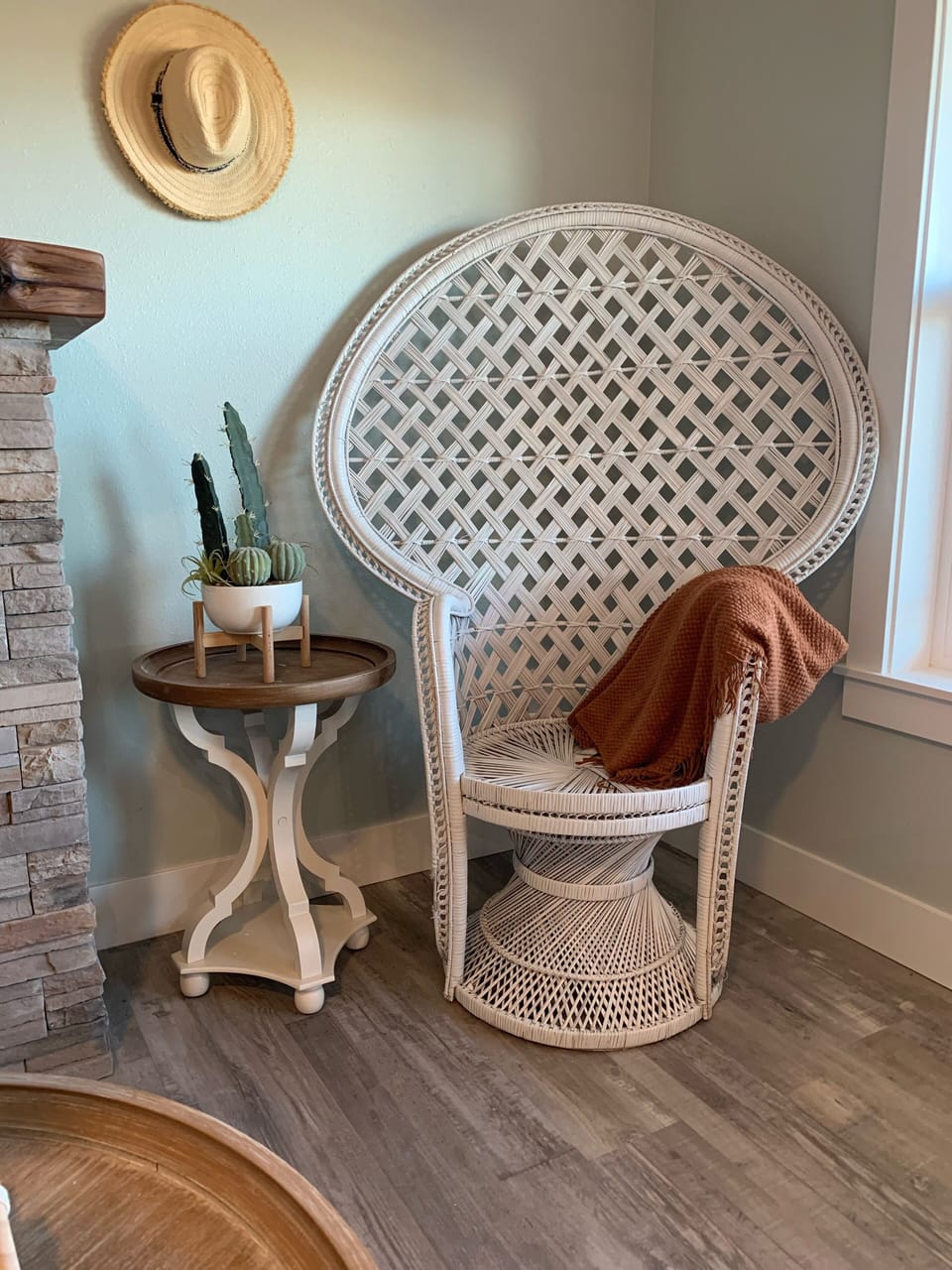 Living room has this gorgeous peacock chair