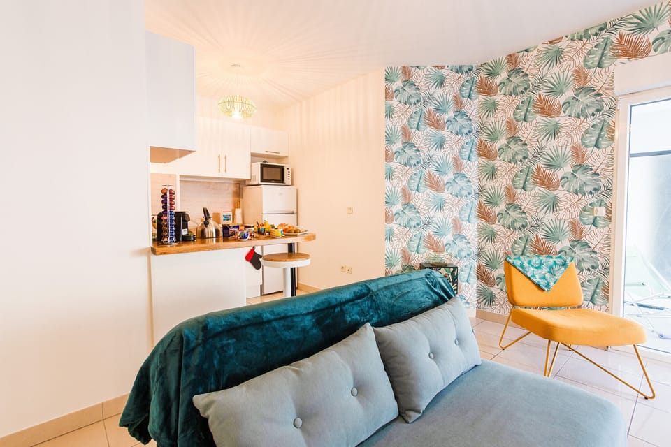 The living room with a single sofa bed