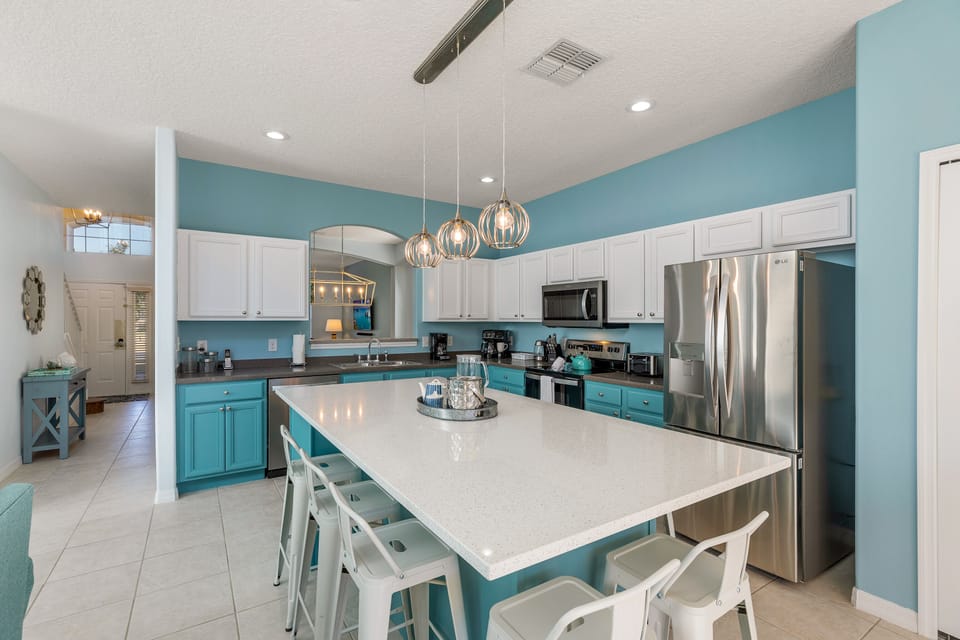 Handy pass through to Dining area, large island seats 8