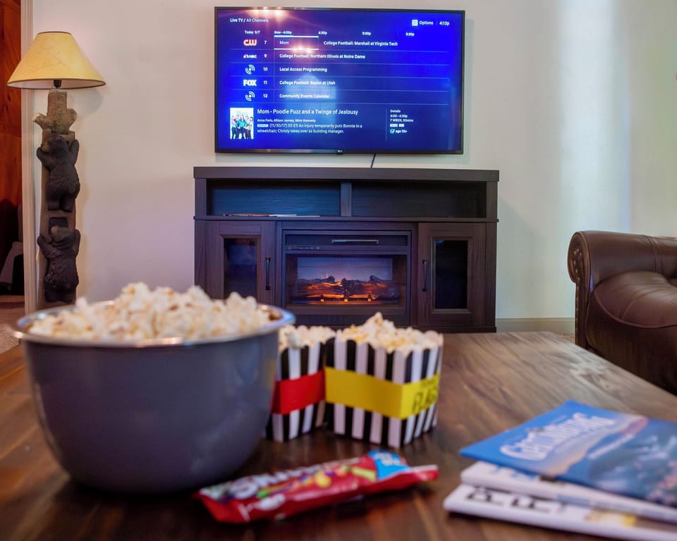 Pop some corn, hug a pillow and binge watch a show on the large 55" TV!  
