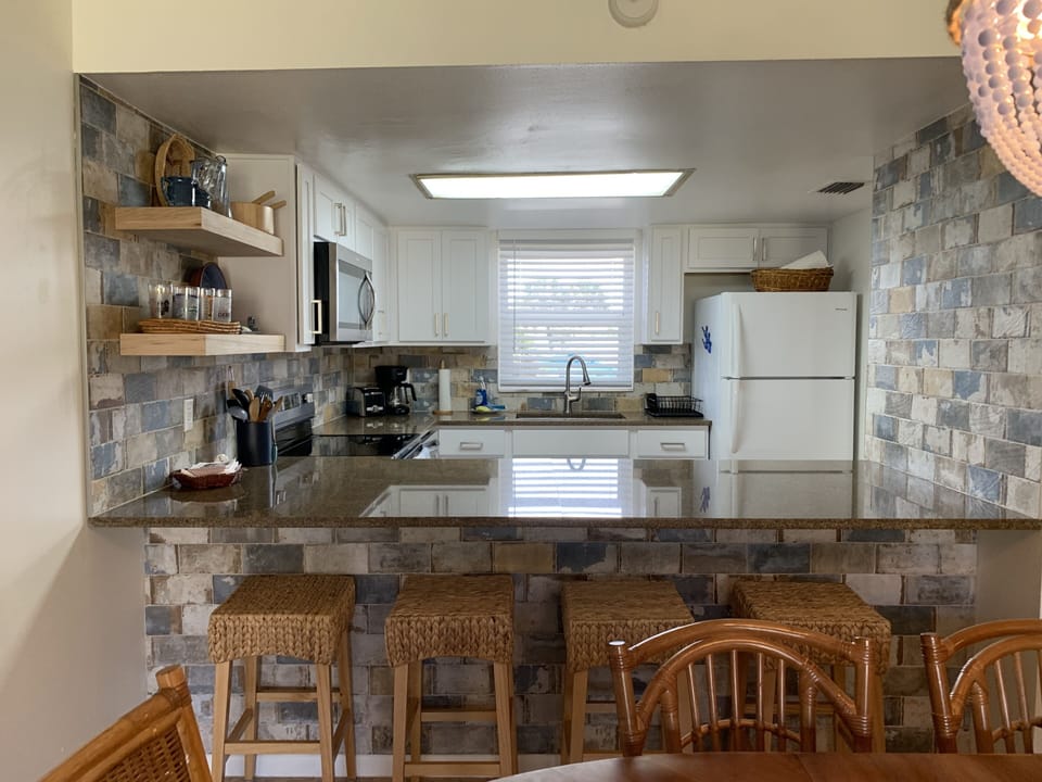 Bright and well organized kitchen. 