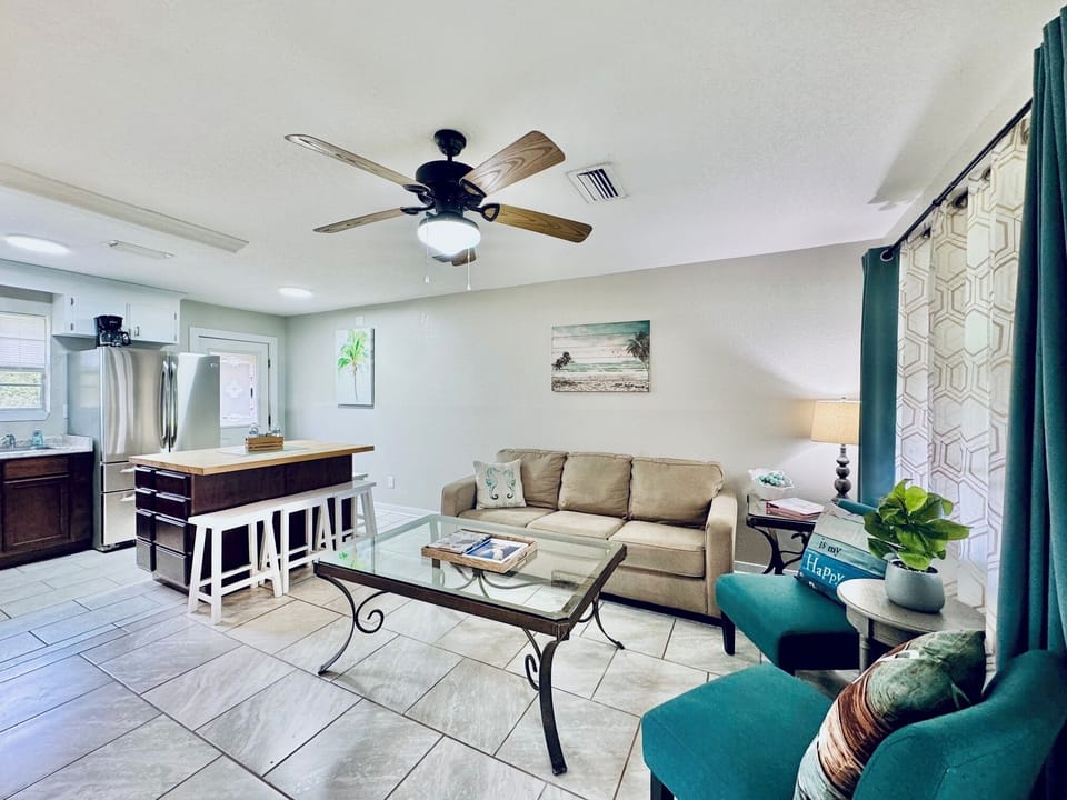 Relaxing Living room and open Kitchen provide great views and interaction.