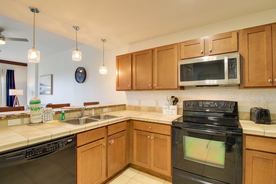 Spacious kitchen + ample counterspace! We have everything you will need to make some quick meals!