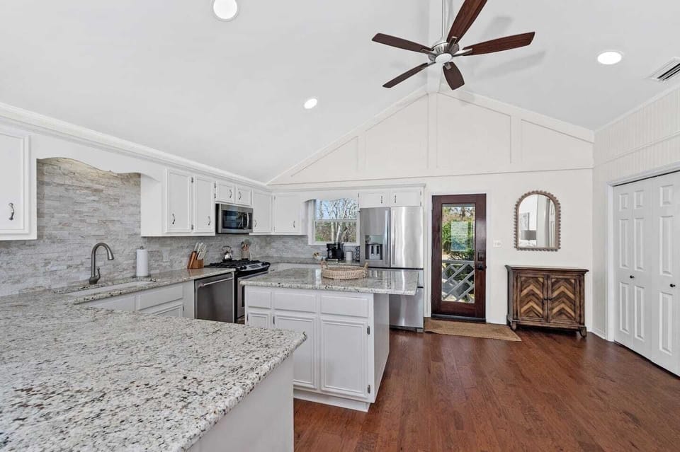 Large well equipped kitchen with lots of added kitchen supplies