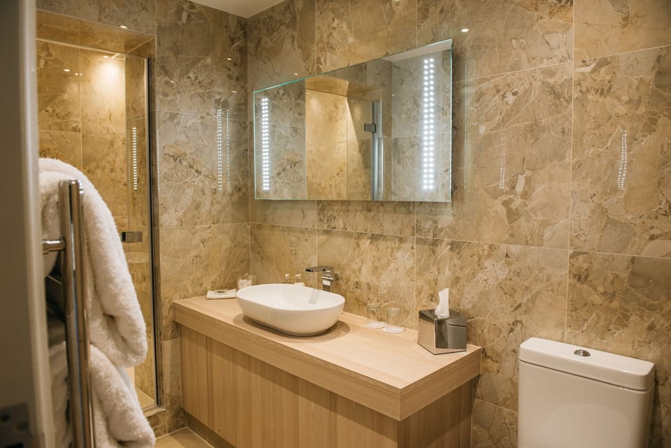 Ground Floor Double Room | Bathroom | Eco-friendly toiletries, hair dryer, towels