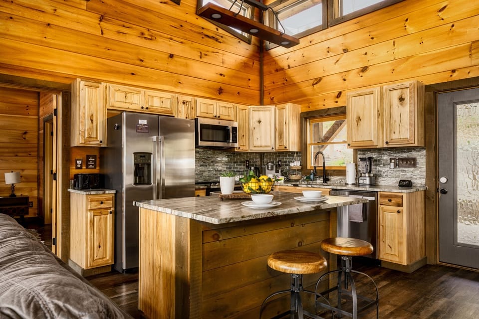 Enjoy the leather granite countertops,  well stocked cabinets with wine glasses, dishes for toddlers and everything else you might need.