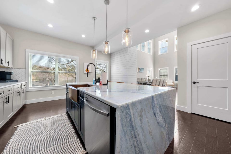 large Kitchen Island with waterfall countertop