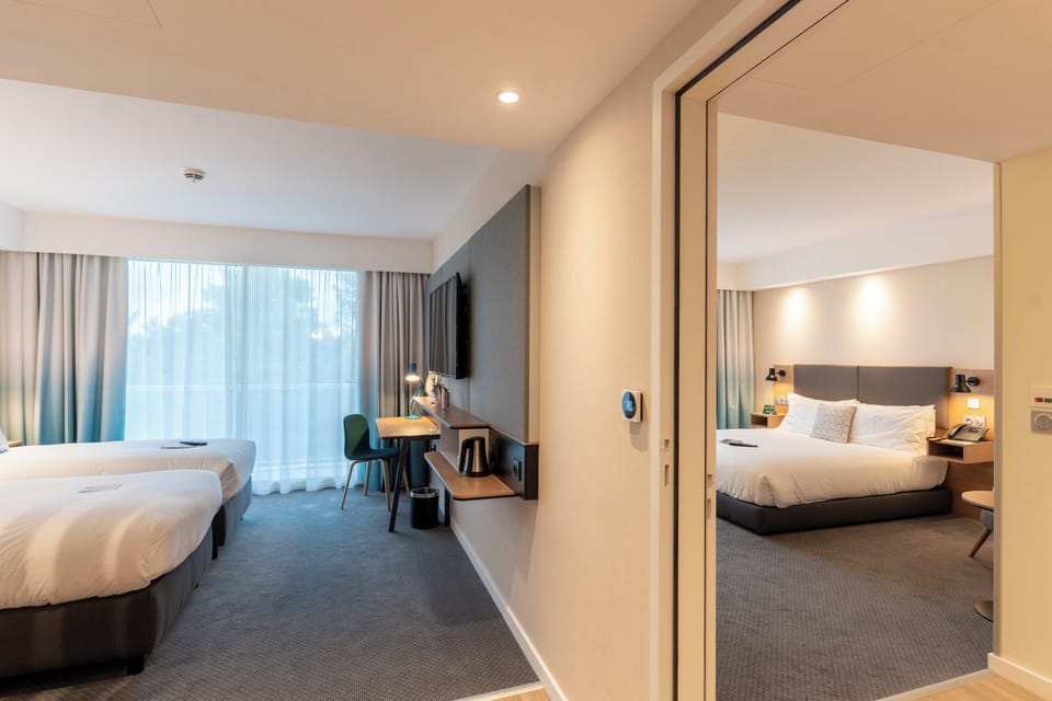 Standard Room, 2 Twin Beds | In-room safe, desk, laptop workspace, blackout drapes
