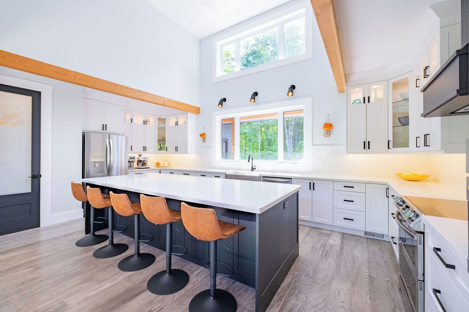 Kitchen with 10 foot quartz island and 16 feet high ceilings 