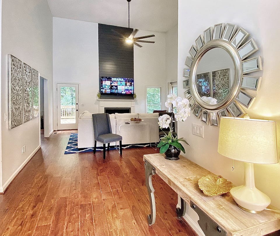 The welcoming entry way is airy with tons of natural light. 