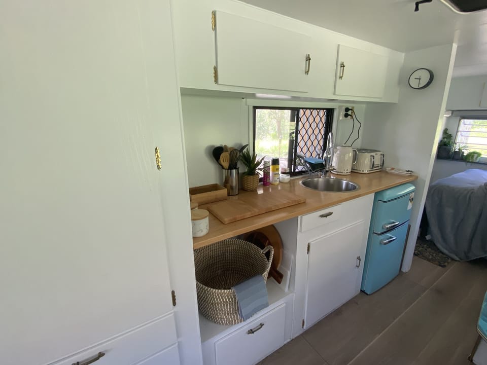 The indoor kitchenette is functional and practical.