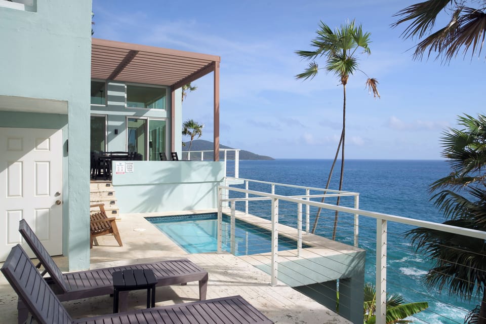 Several gorgeous coral stone patios for sun lounging, swimming and relaxing!