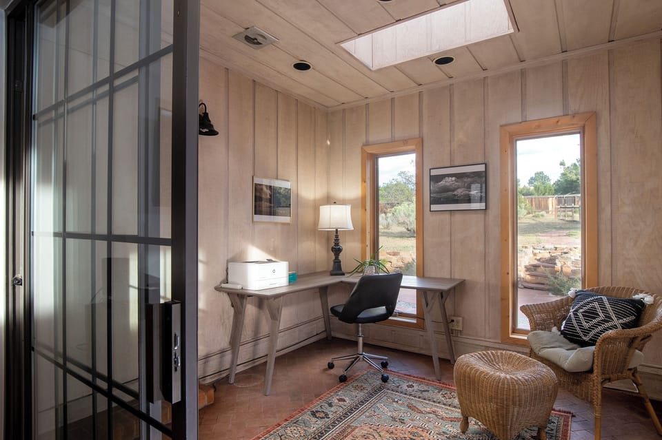Sunroom/office area off the living room. High speed internet is included. 