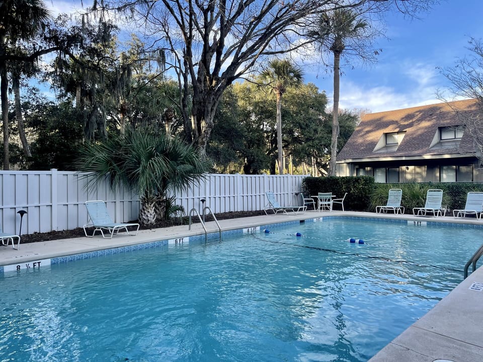 The pool is 75 steps from the condo