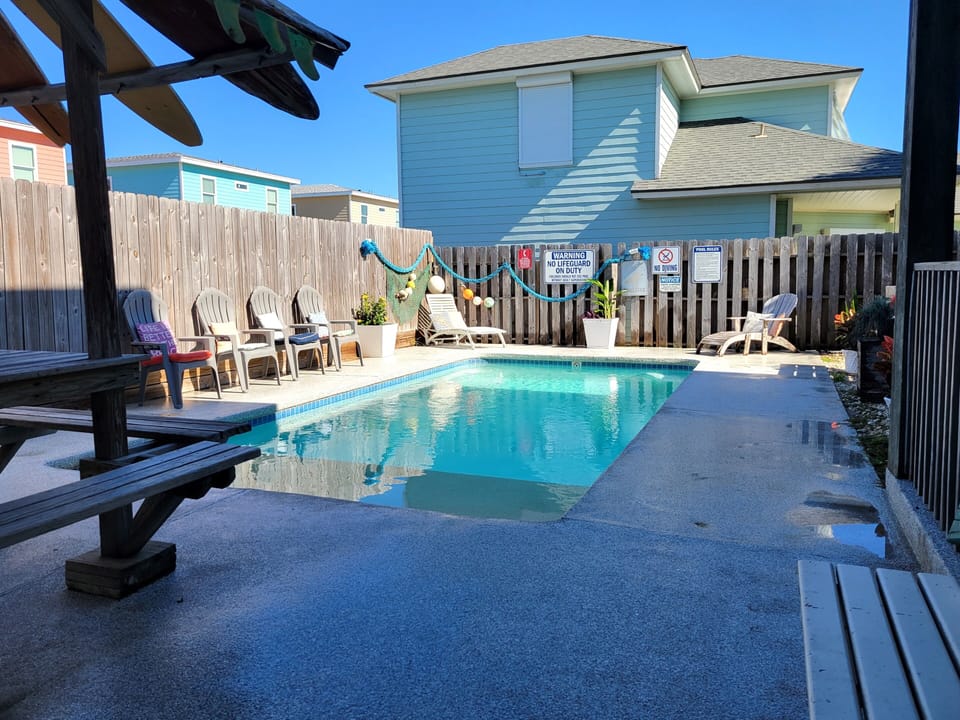 Relax by the private pool with plenty of seating for your group.