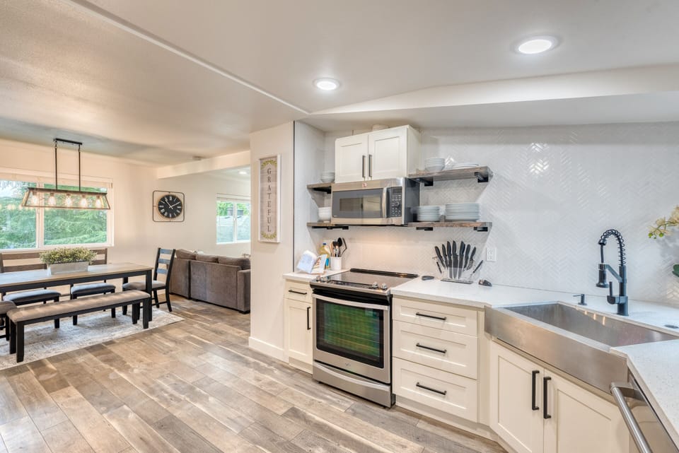Remodeled Farmhouse theme kitchen with quartz counter top