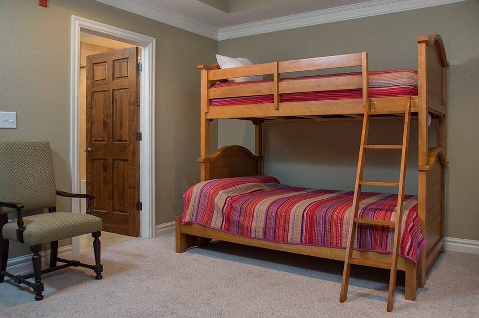 Bunk beds downstairs - full bed on bottom and twin on the top.  Private bathroom