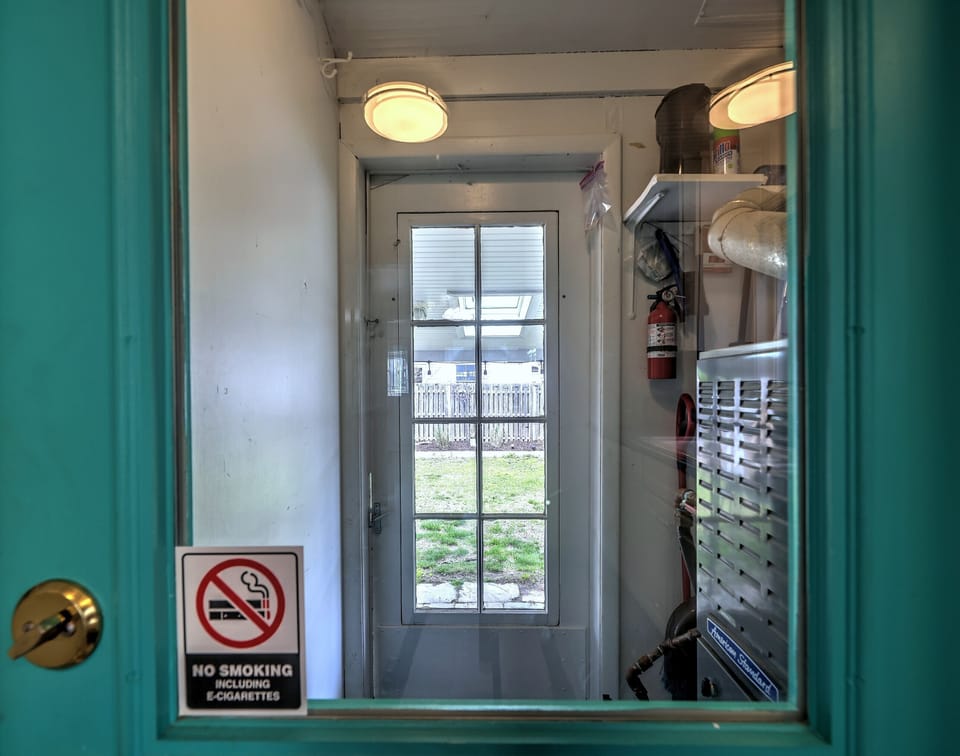WINDOW TO BACK PORCH AREA