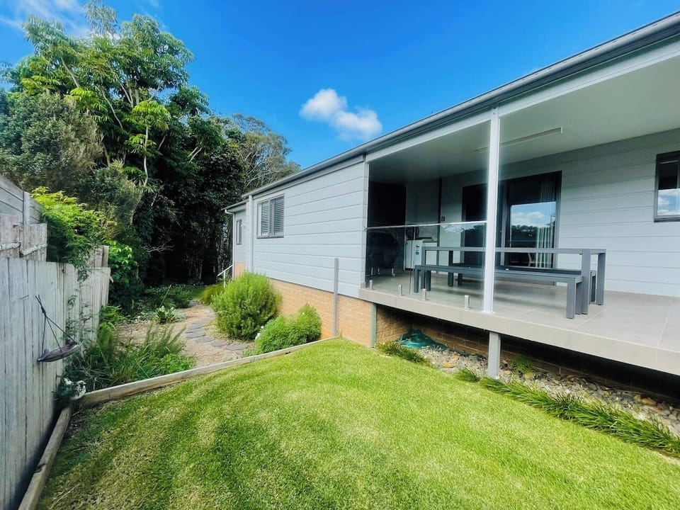 Warm Sunny patio , lush green lawn for the kids to enjoy. Possums appear at night scaling the side fence or spot the Koala or Deer sneeking through