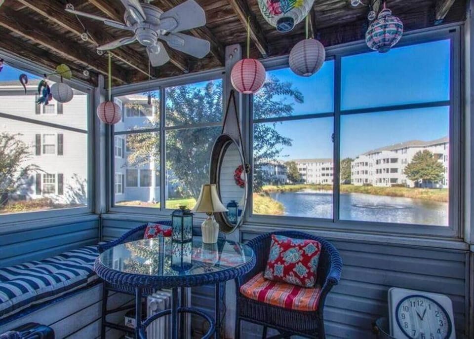 Patio with back door out to pond