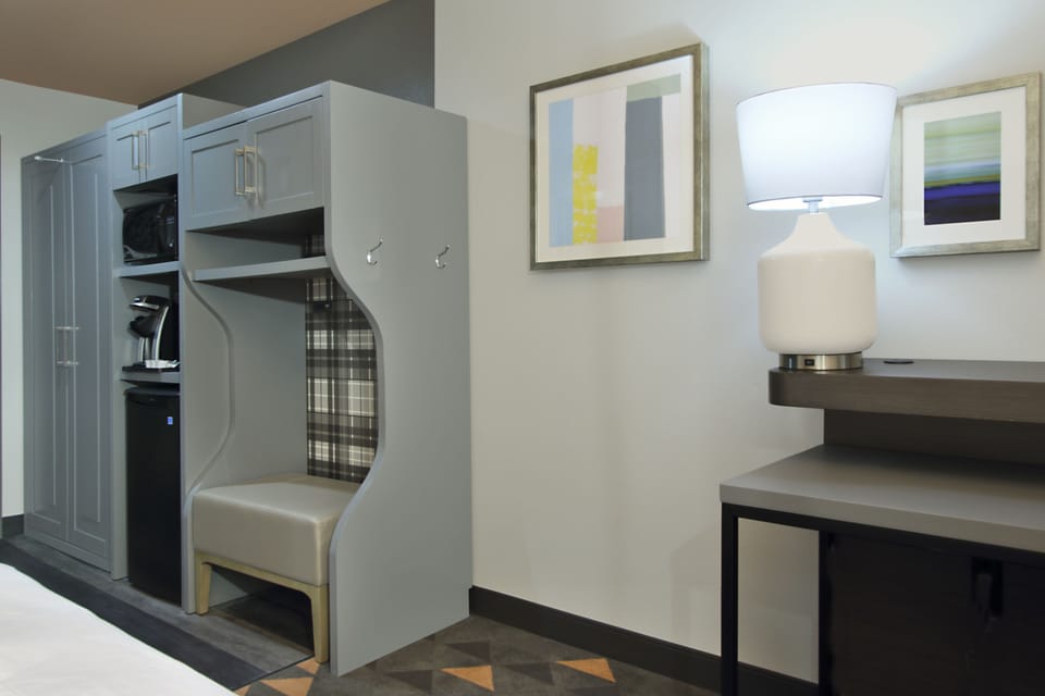 Desk, blackout drapes, iron/ironing board, free cribs/infant beds