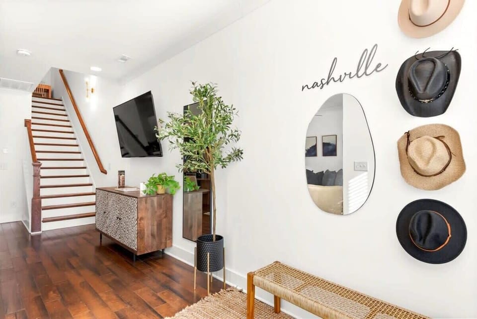 As you walk into your home away from home, the Nashville vibes, immediately start.