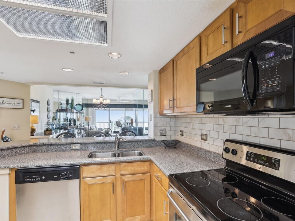 Kitchen Open to Dining Area and Living Room at 506 Barrington Arms
