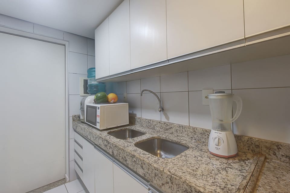 Basic Apartment | Private kitchen | Cookware/dishes/utensils, dining tables