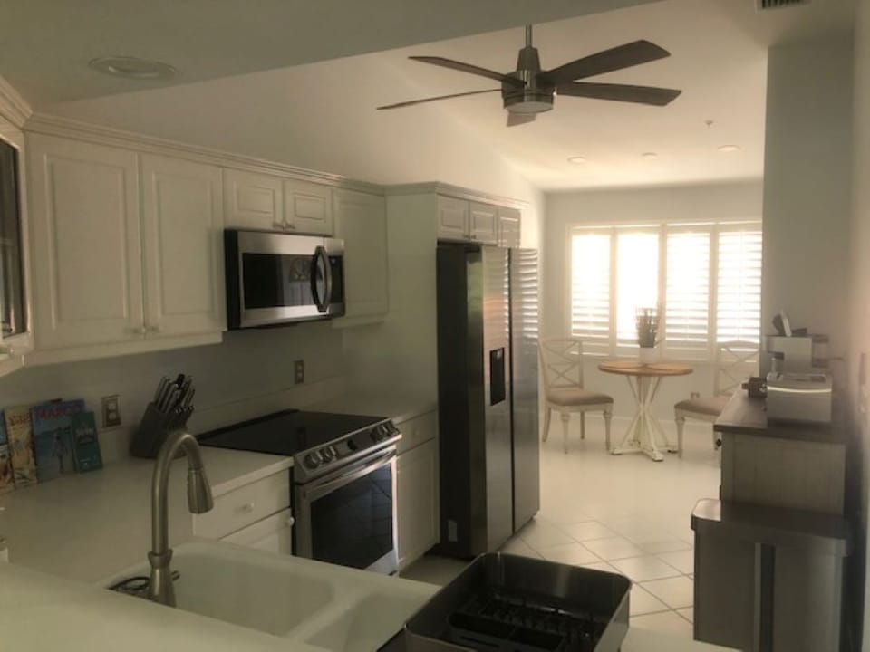 Clean kitchen, new appliances throughout, well lit space, cozy breakfast nook.
