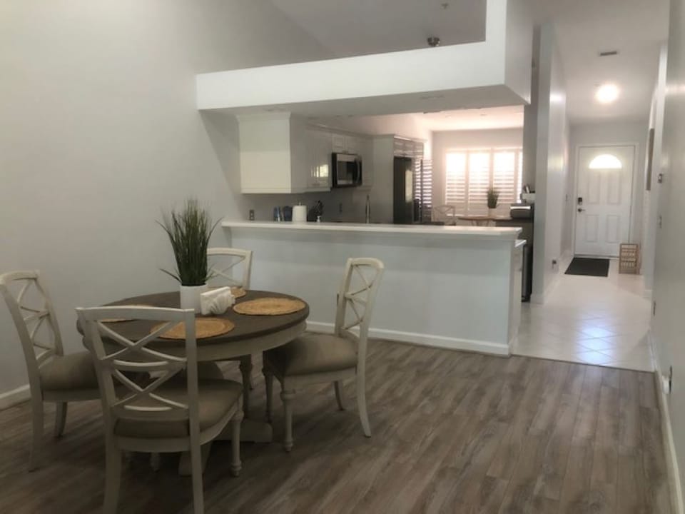 View of entrance, breakfast nook, kitchen, and dining. 