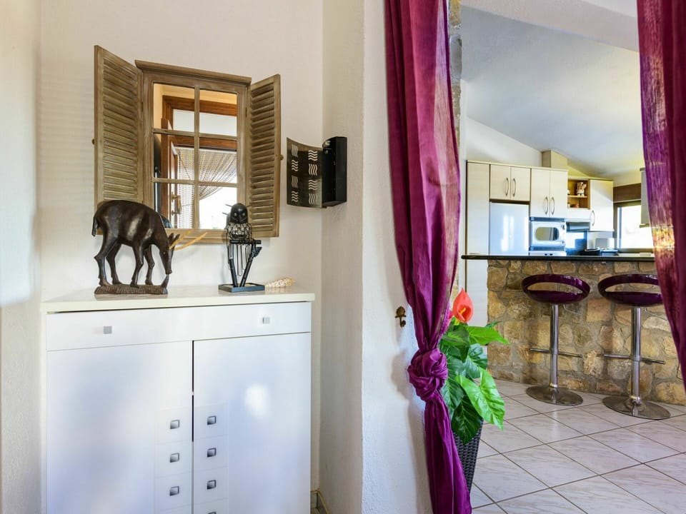 Property, Furniture, Purple, Interior Design, Flower, Wood, Textile, Decoration, Cabinetry, Violet