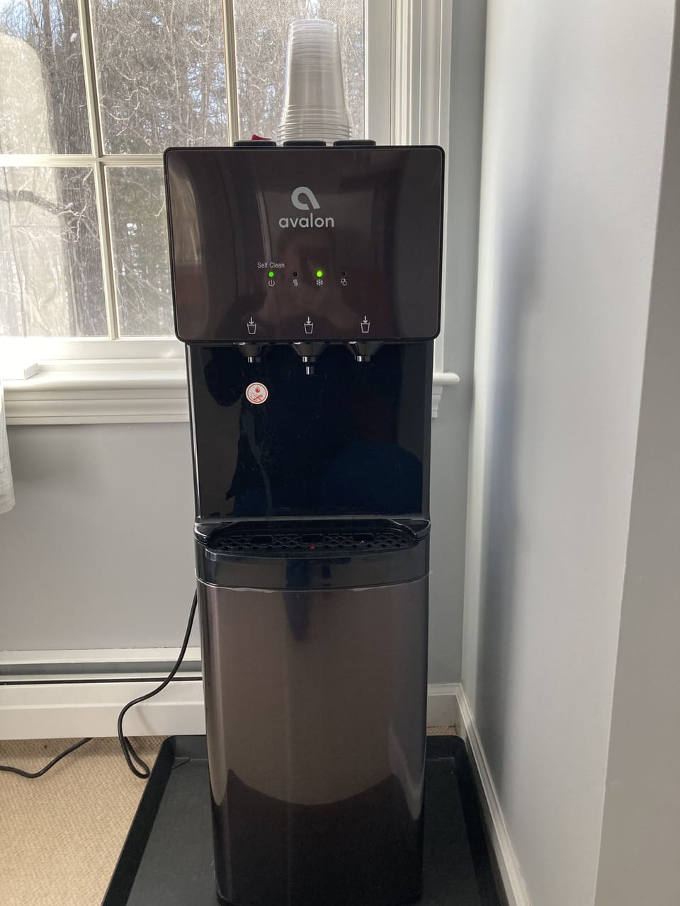 Water cooler also provides hot water for complimentary herbal teas 
