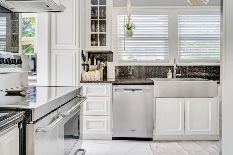 Well stocked kitchen with new stainless steel appliances