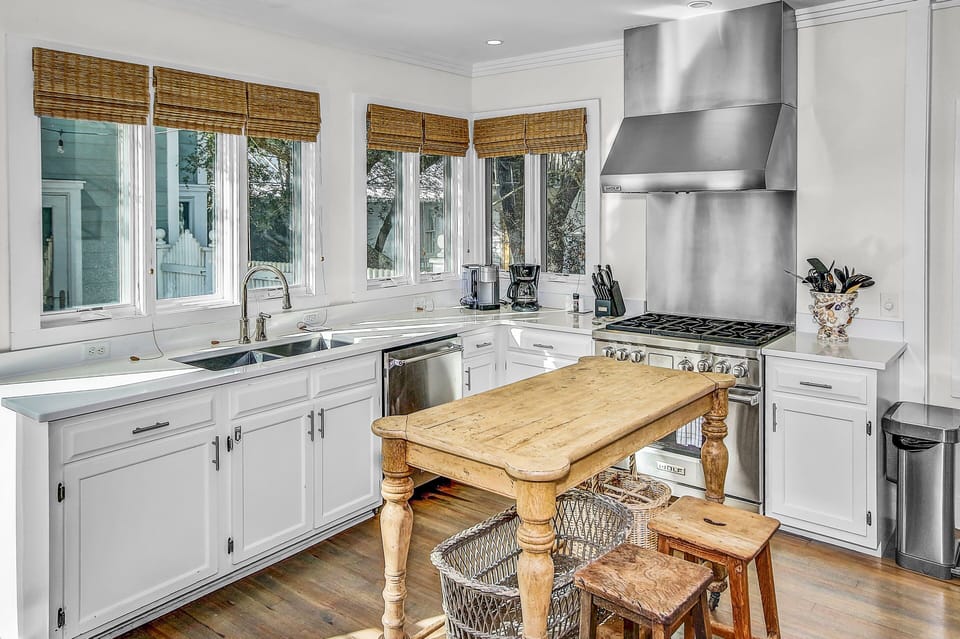 Chef's Kitchen with Natural Lighting, Breakfast Seating, and Professional Grade Appliances