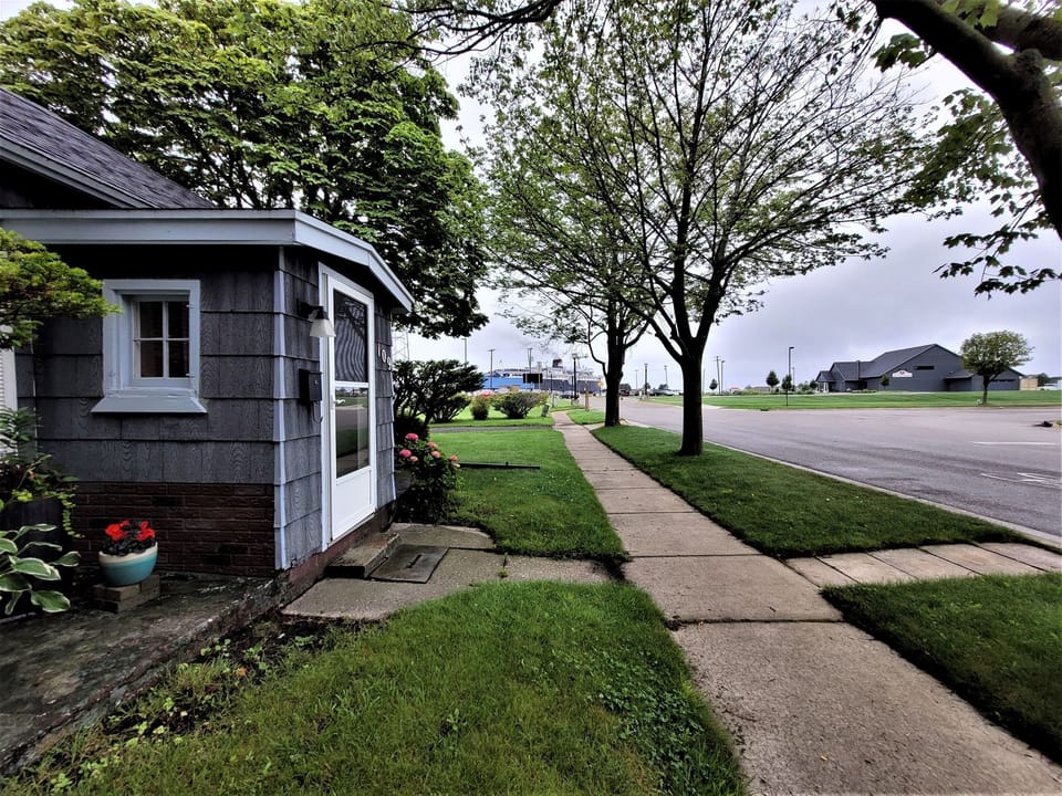 Front of house; view of SS Badger and The Lake House