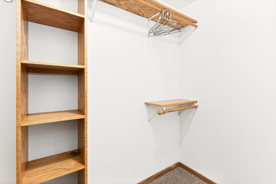 Upstairs bedroom with queen bed. Roku tv and large walk-in closet. 