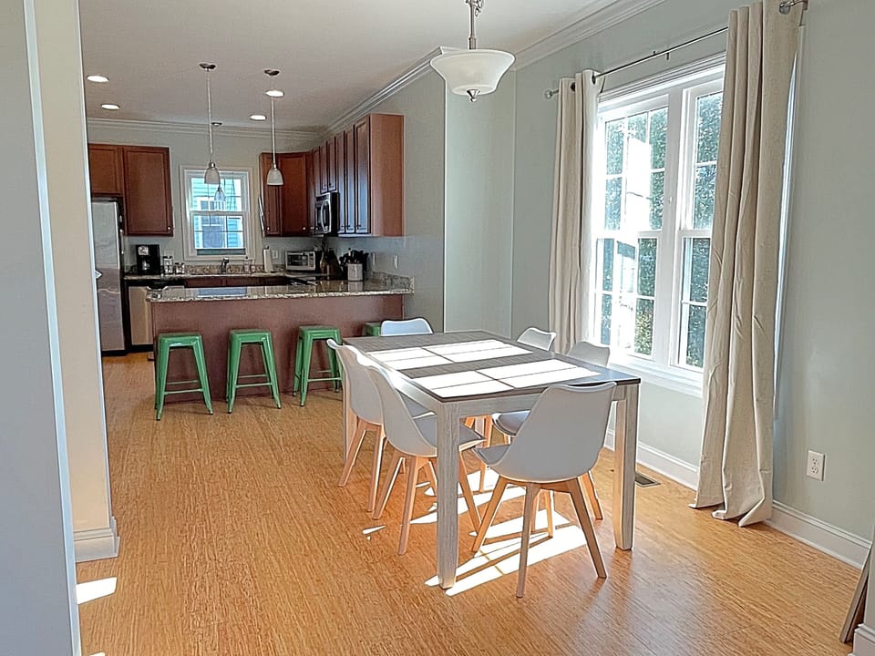 Plenty of seating in our sunny kitchen/dining area. 