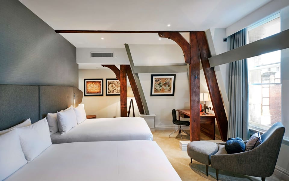 Deluxe Room, 2 Queen Beds, Non Smoking | In-room safe, free WiFi, bed sheets, alarm clocks