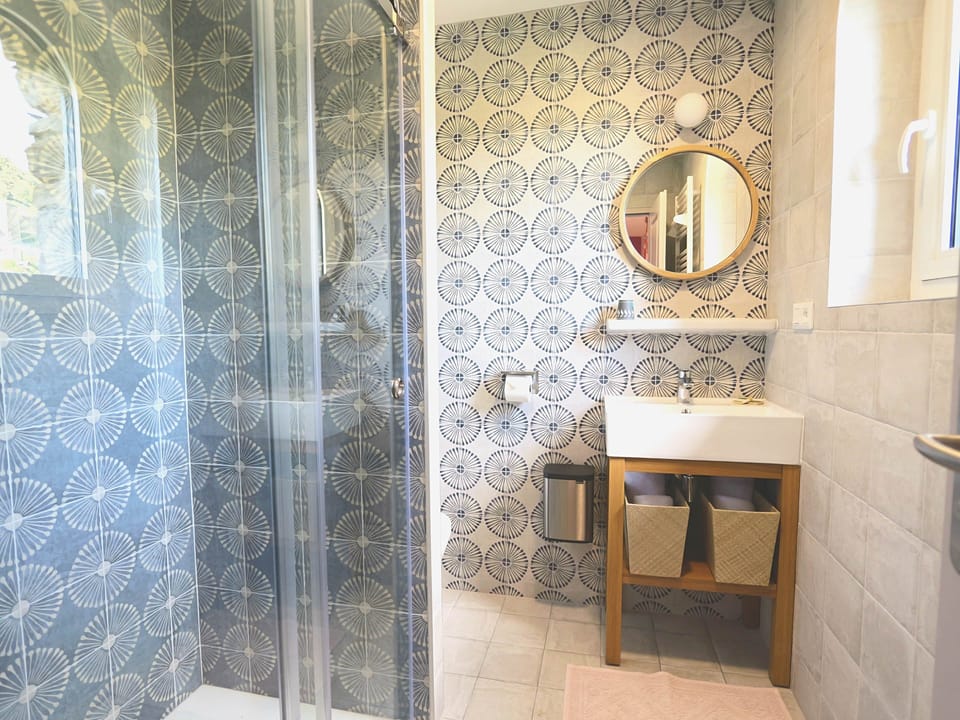 Blue bedroom with en-suite bathroom and WC