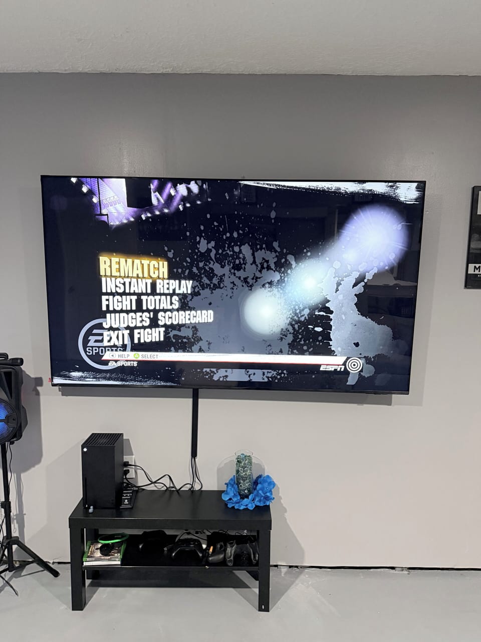 Xbox X with a 75 inch TV.
