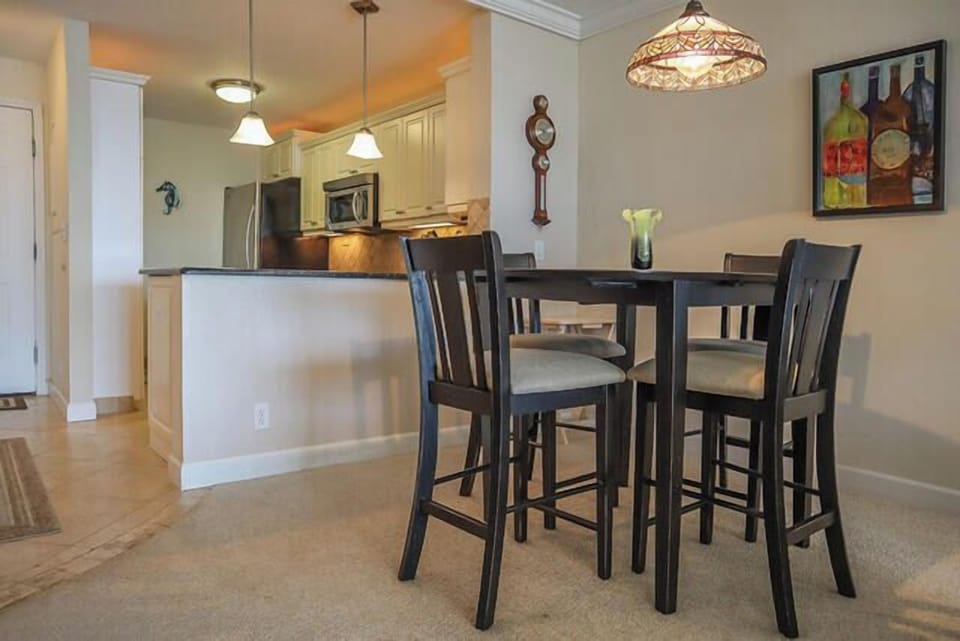 Dining Area has a high table for 4