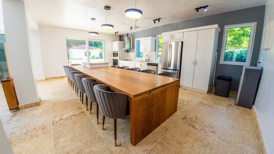 Large fully equipped kitchen with seating for 14 people