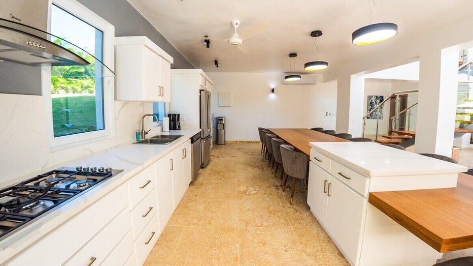 Large fully equipped kitchen with seating for 14 people