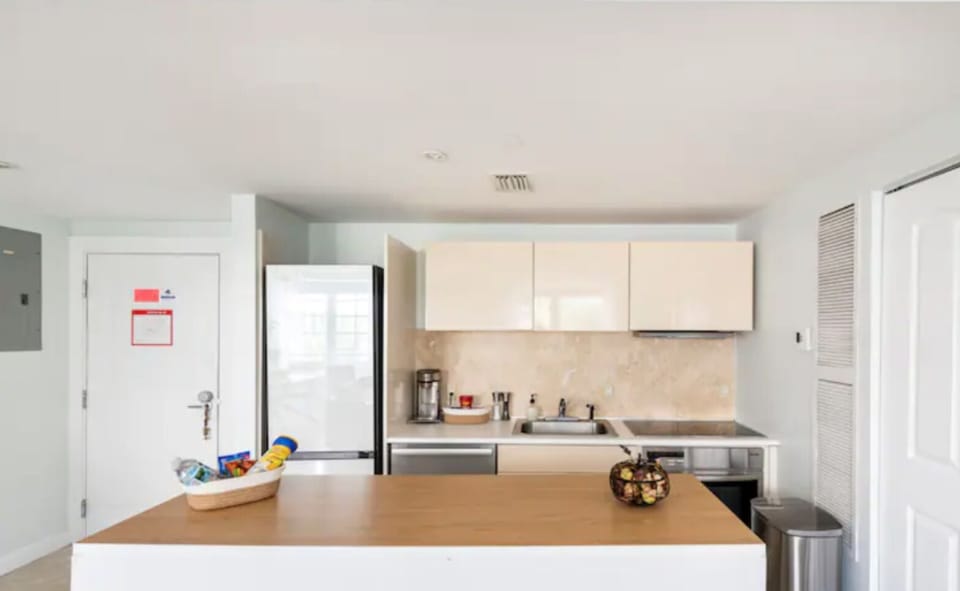 Complete kitchen with Miele Dishwasher & Stove, Samsung Fridge and all utensils