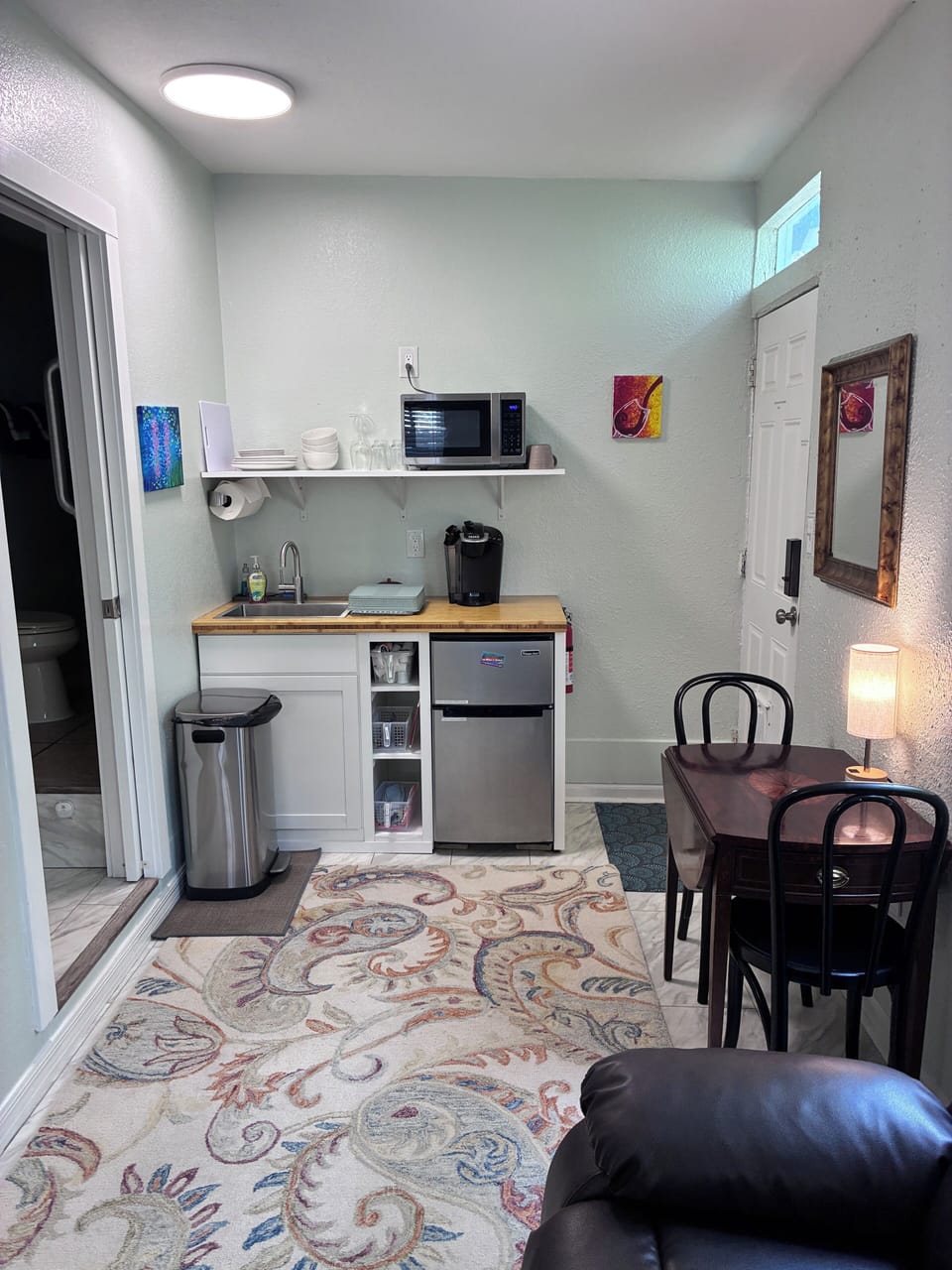 Kitchenette with dining area.