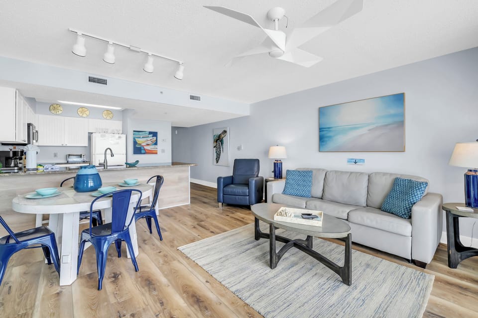 Relax in your bright, coastal-inspired living space with modern furnishings and nautical touches that make you feel instantly at home.
