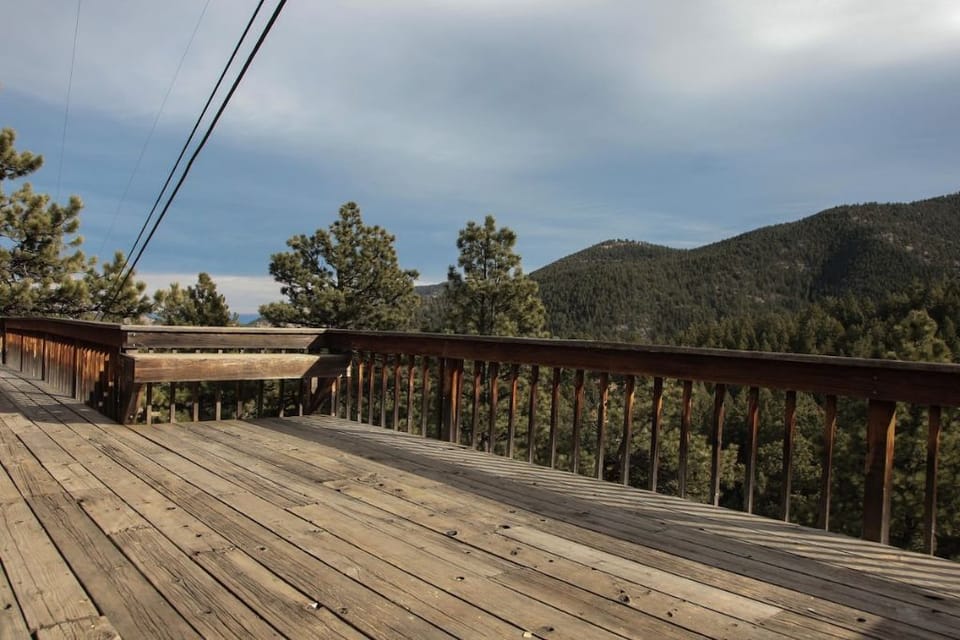 Deck with views of surrounding mountains and Roosevelt National Forest